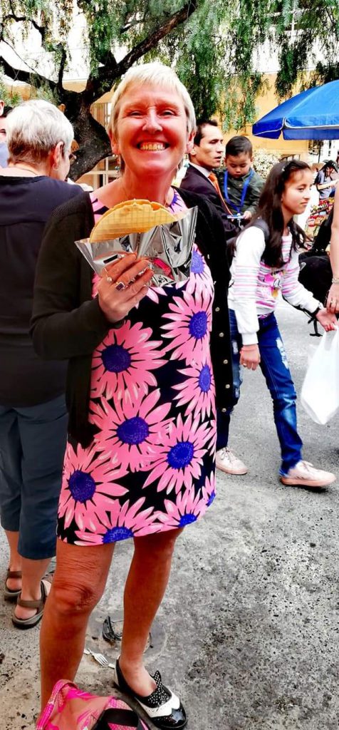 Me with a waffle from the Mick Jagger cart in Bogota, Colombia