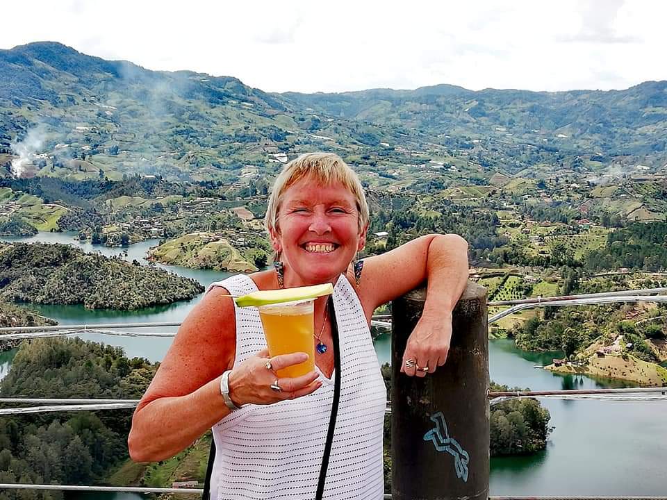 A beer with mango at the top of El Penol rock, Guatape, Colombia