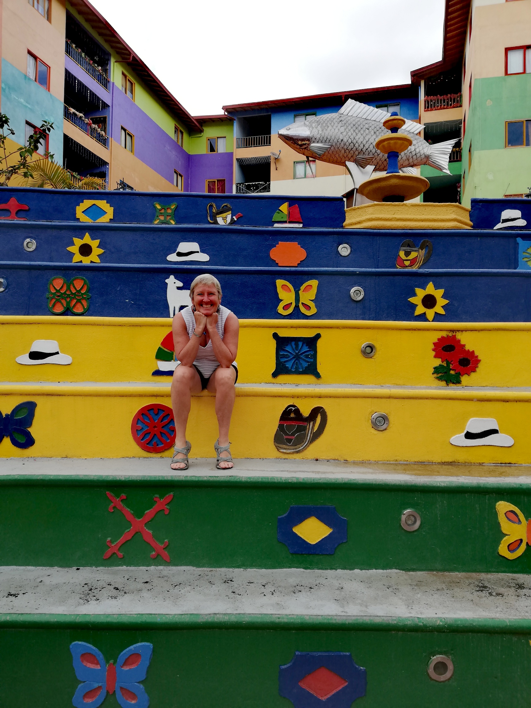 Me sitting on the colourful steps in Guatape