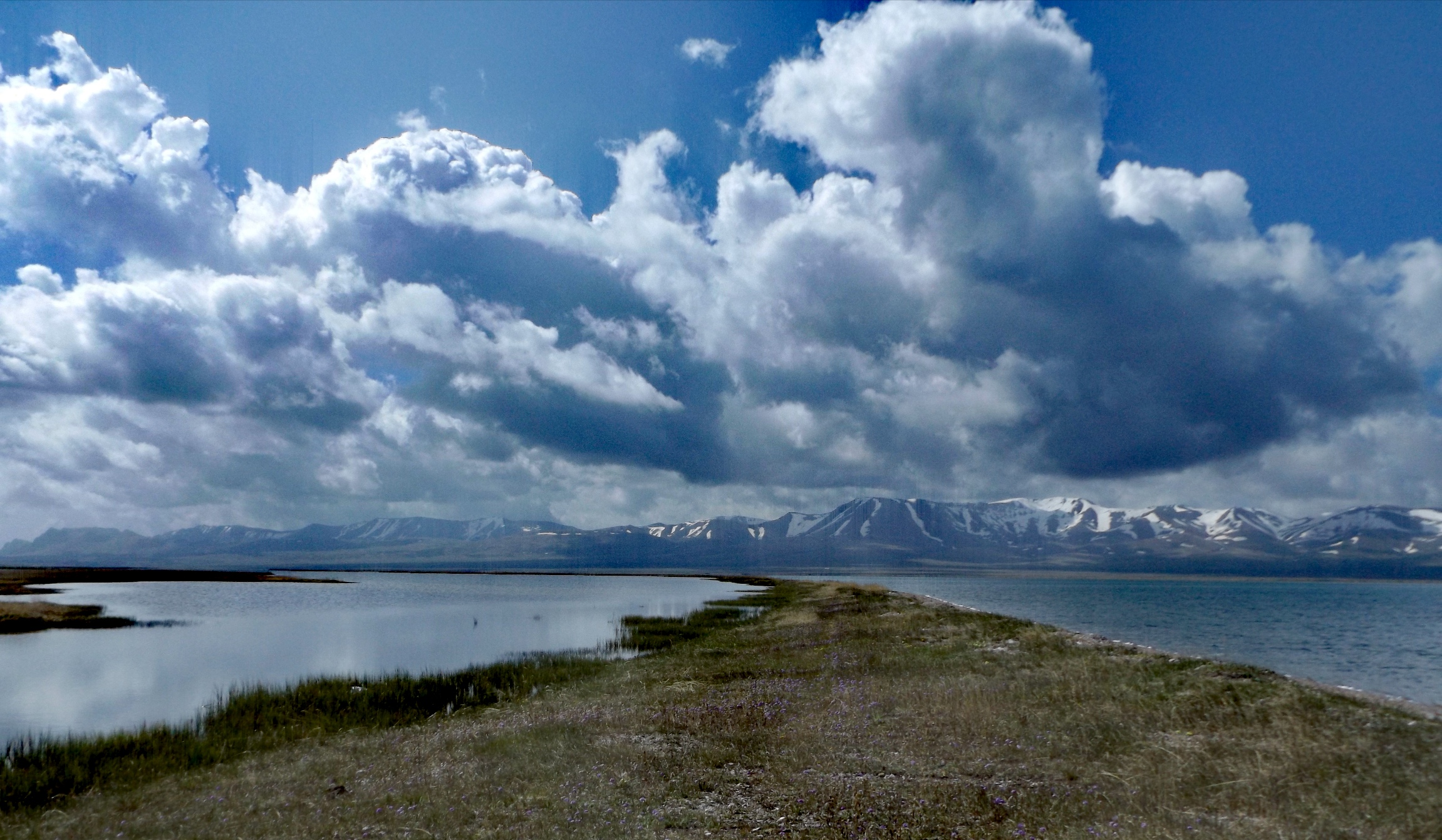 Promontory dividing Son Kol lake, Kyrgyzstan