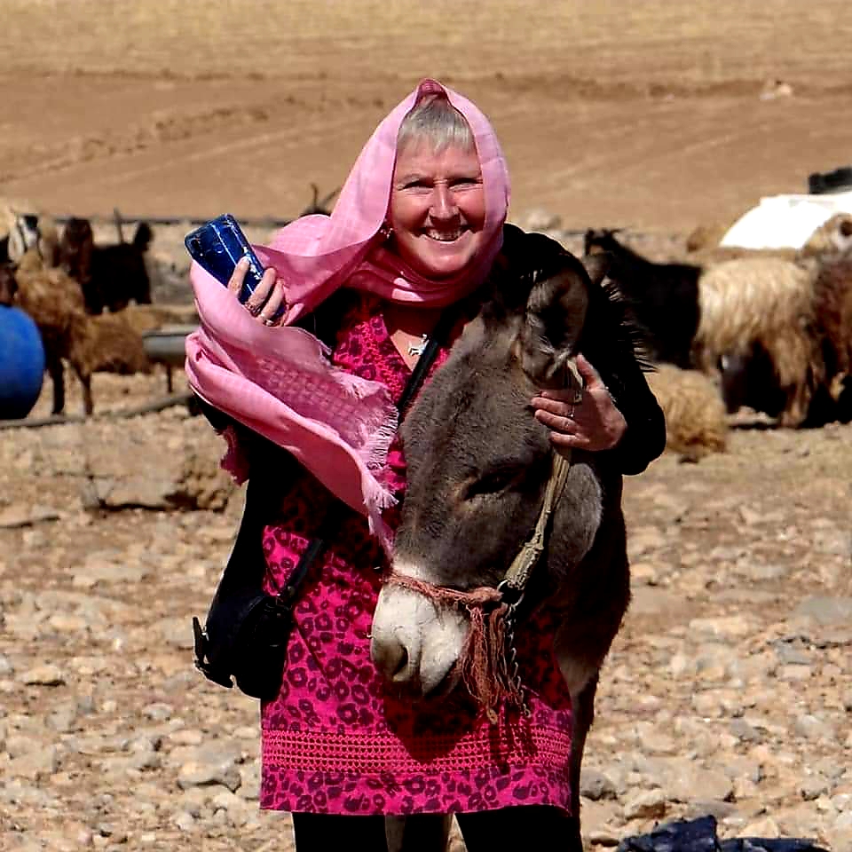Lynn with a donkey in Iran
