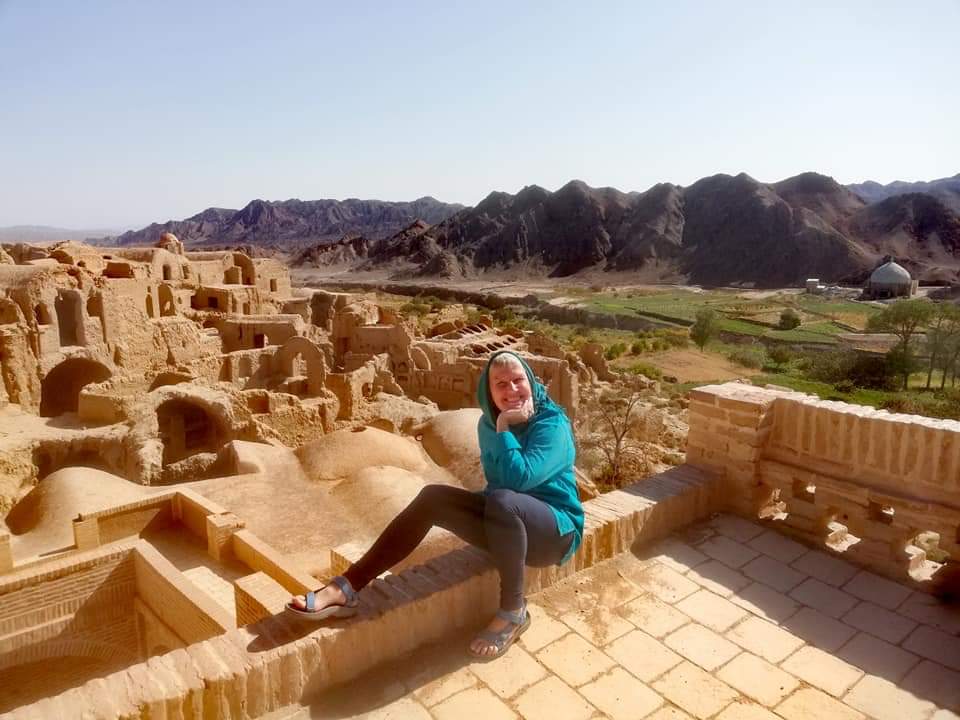 Lynn at Kharanaq with mosque in the distance