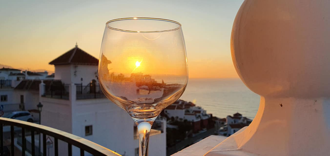 wine and sunset in nerja