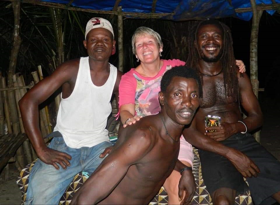 Lynn Stephenson with locals in Sierra Leone