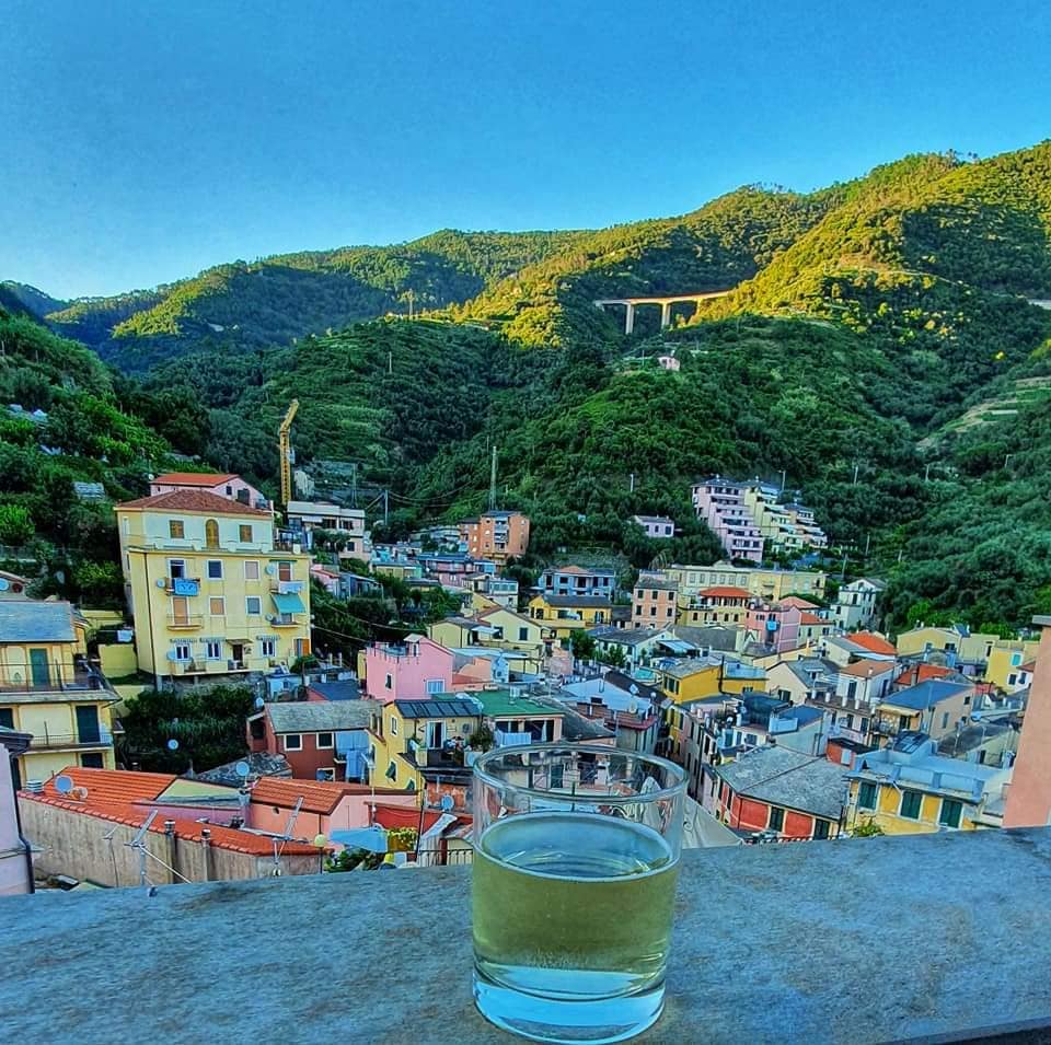 a glass of wine on the rooftop terrace