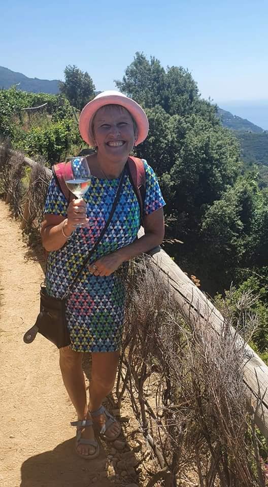 a welcome glass of wine in the vineyard