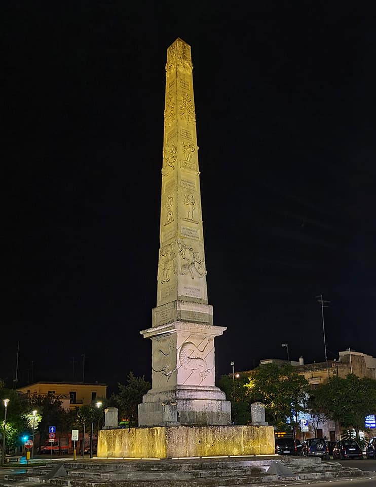 illuminated obelisk in lecce