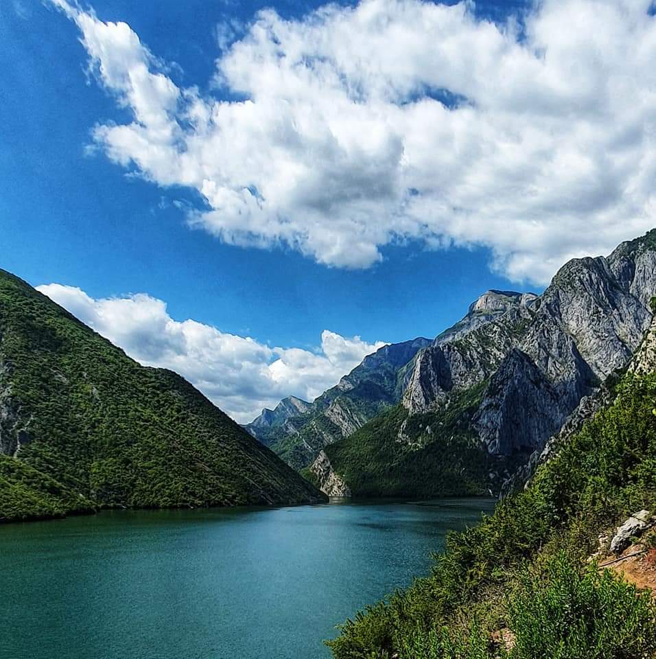 view of komani lake clouds