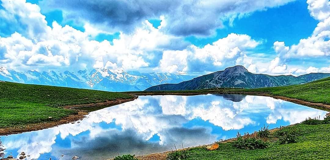 reflections on Koruldi lake Svaneti