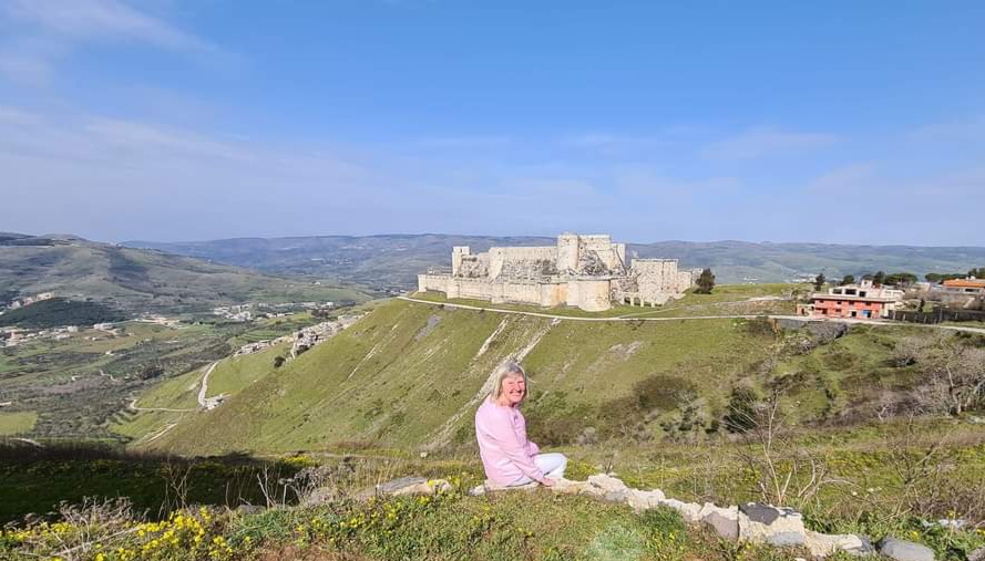 Me on the hill next to Krak-des-Chevaliers castle, Syria