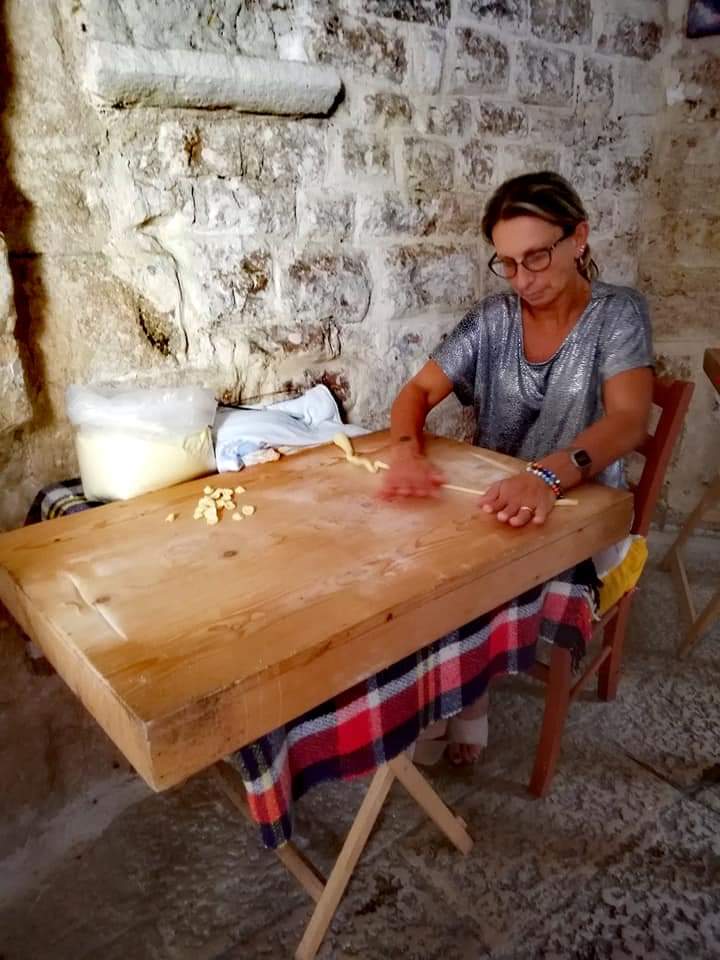 A nonna making pasta in Bari, Puglia, Italy