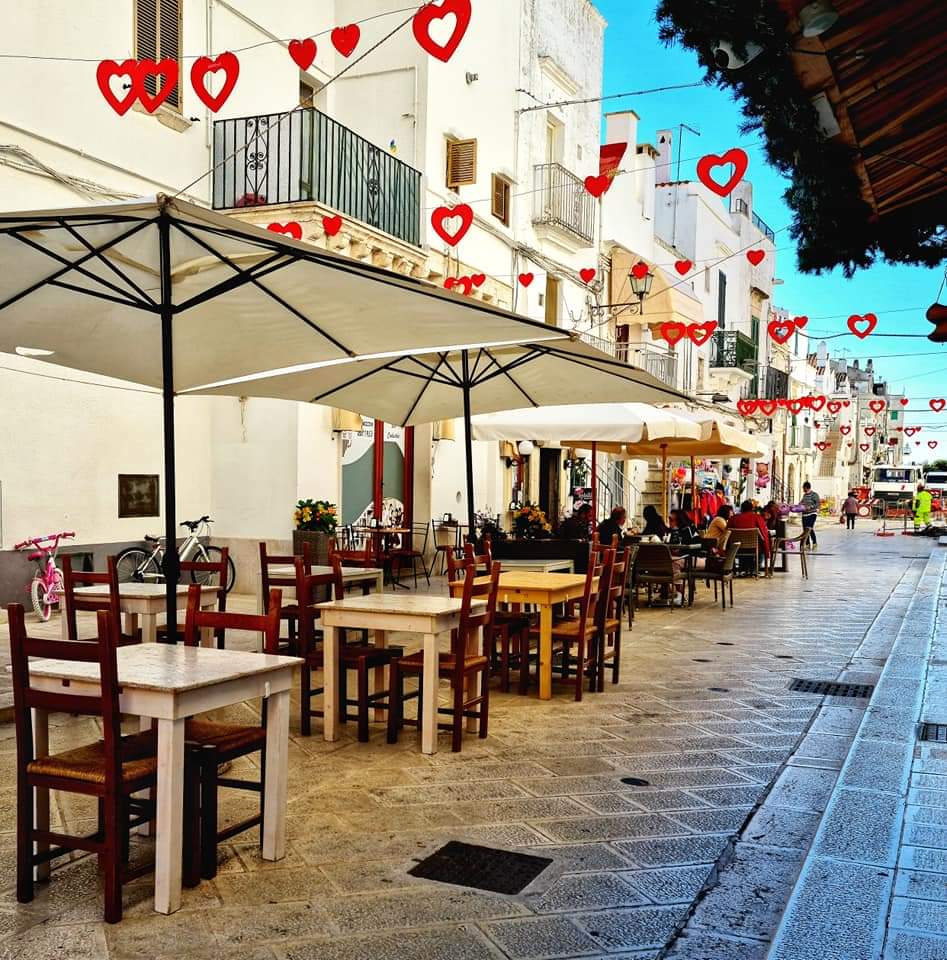 A colourful street in Cisternino, Puglia, Italy