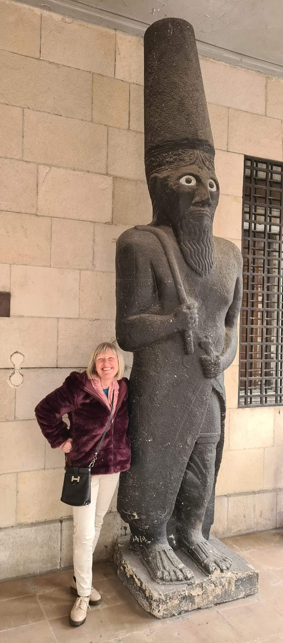 Me and an enormous statue at the National Museum, Damascus,Syria