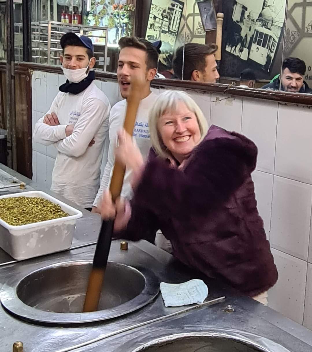 Me helping to churn ice cream in Damascus, Syria