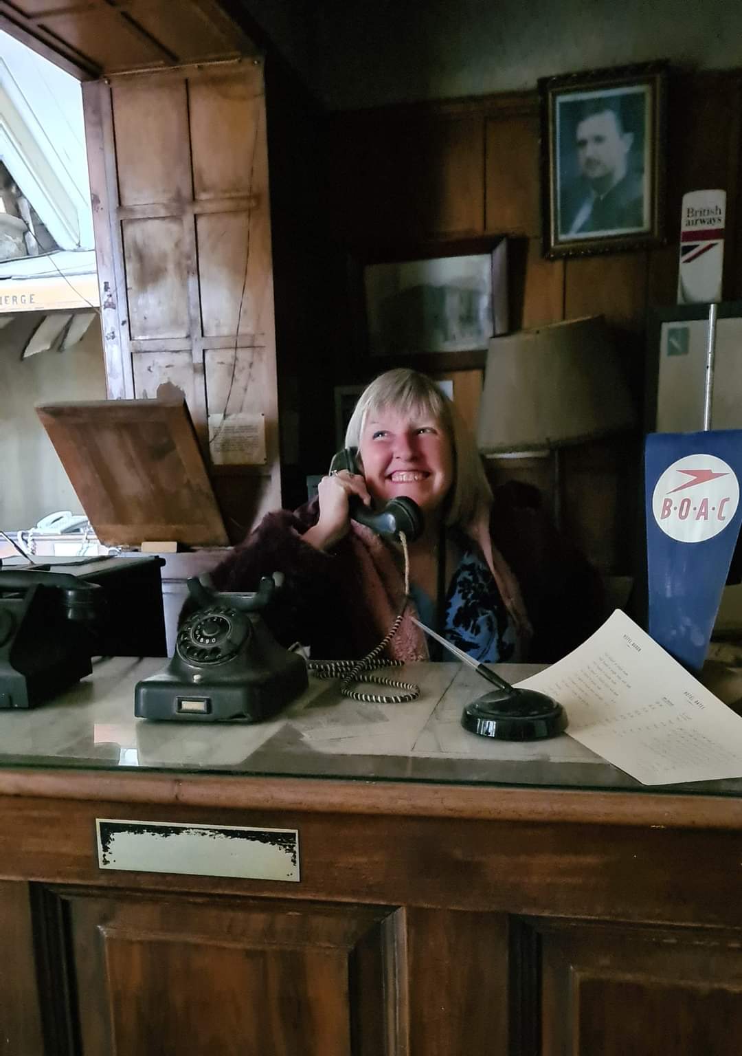 Me behind the reception desk of the Baron Hotel, Aleppo, Syria