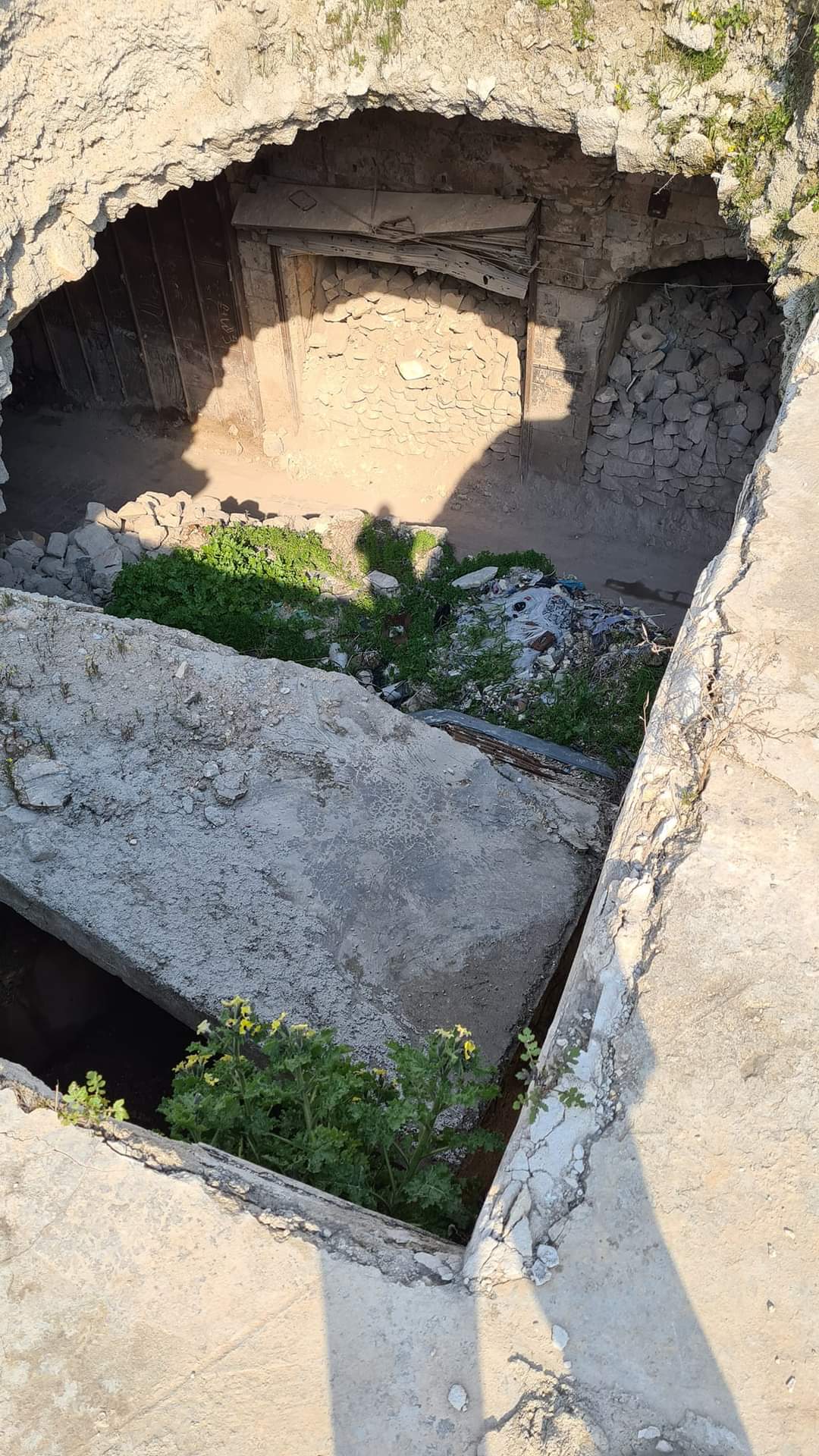 A bomb crater at Aleppo souk, Syria
