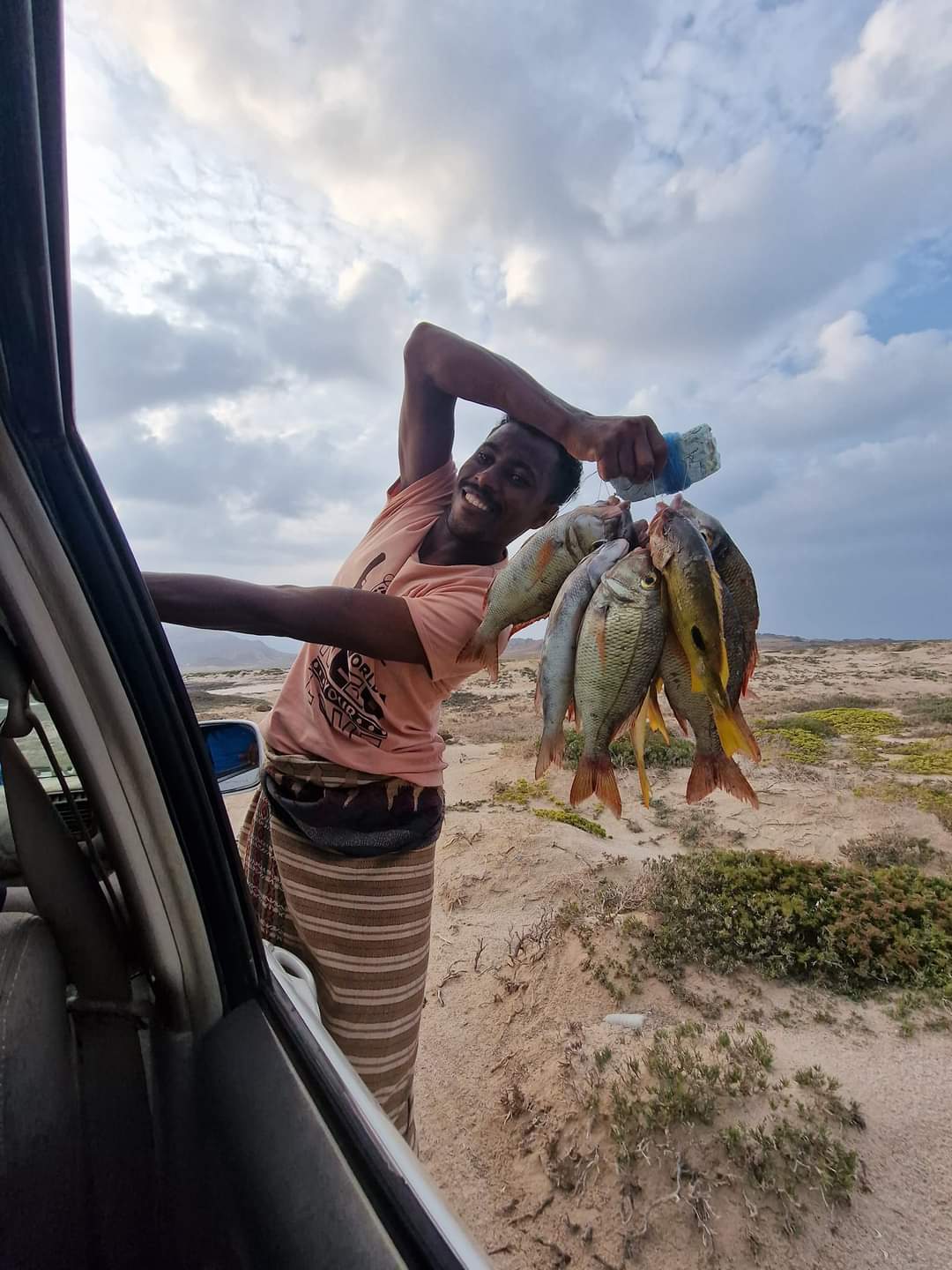 A local fisherman hitching a lift in Socotra