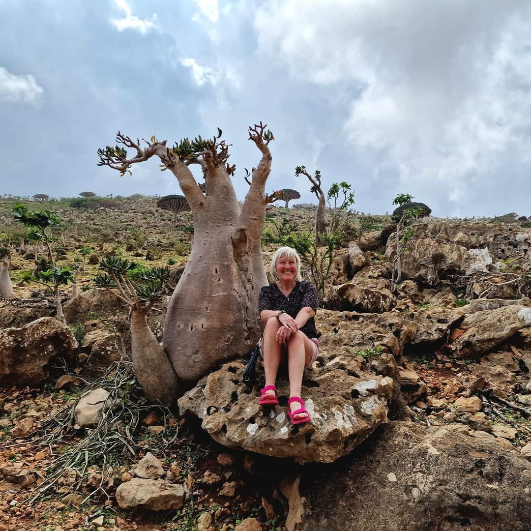 Me sitting next to a Dragon Blood tree